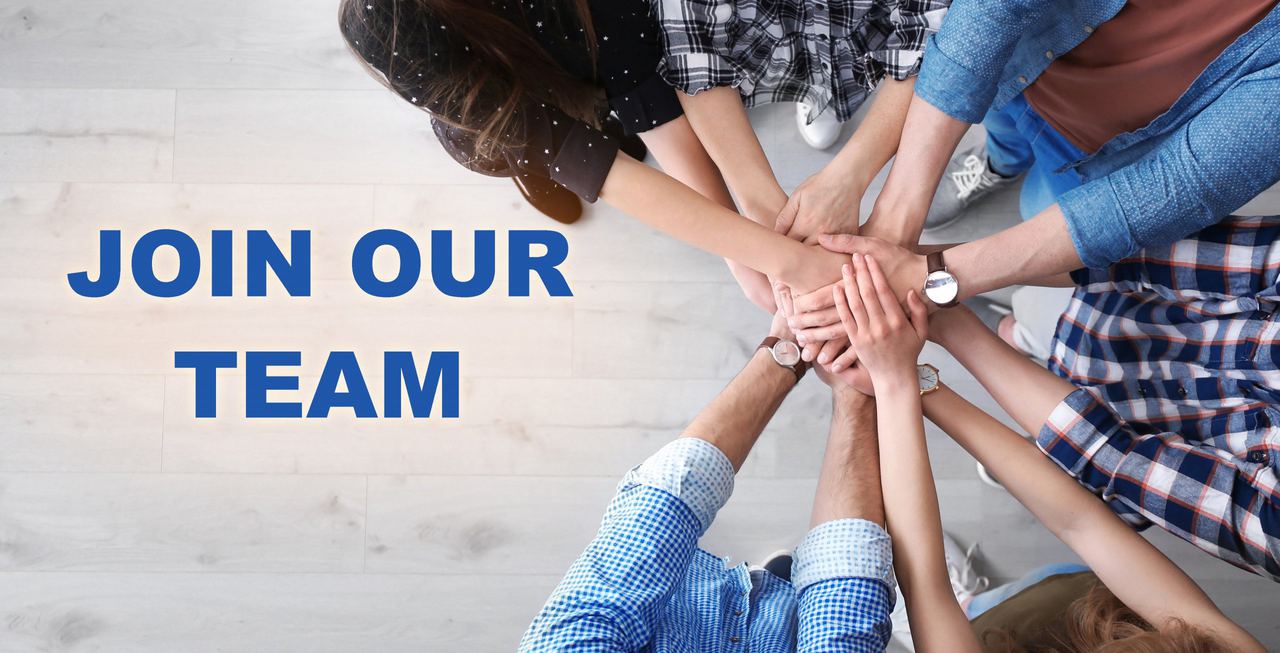 “Join our team” lettering beside a group of people stacking their hands together