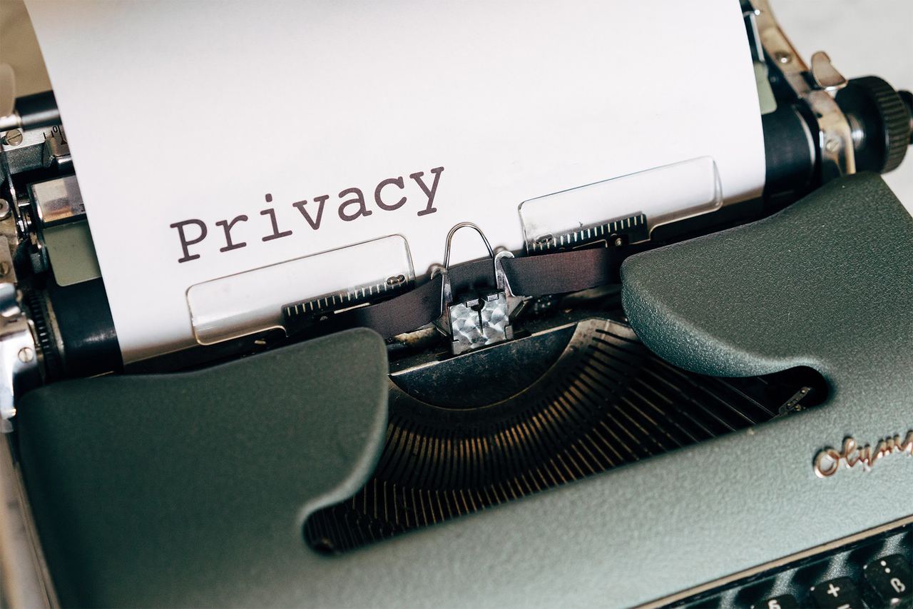 Typewriter with a sheet of paper reading “Privacy”